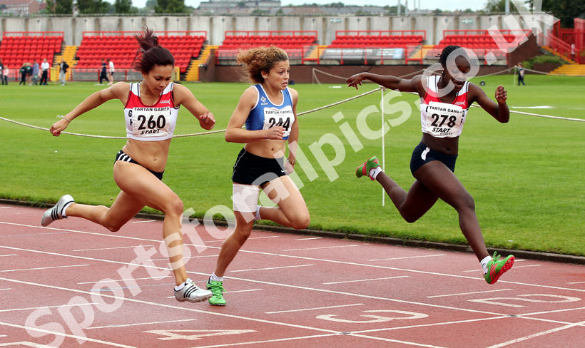 Close race in the Under-15 100 metres, from left to right 260 Sydney Robertson (Gateshead) 2nd, 244 Hollie Lancaster (Sunderland Harriers) 3rd and winner Davina Nylander (Gateshead), Gateshead Tartan Games